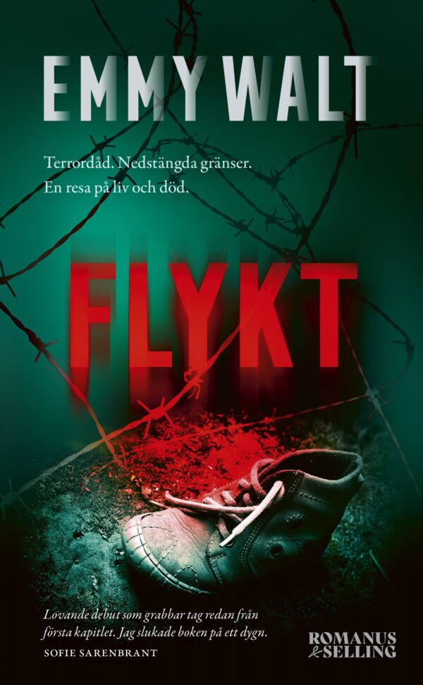 O_emmywalt_flykt_pocket_IBN_XXXXX_utkast.indd Boken Flykt. På det gröna omslaget finns taggtråd och en barnsko samt namnet Flykt i illröd text.